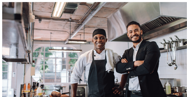 Black business men in restaurant